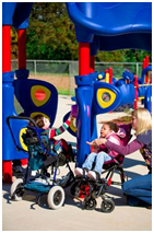 children in wheelchair talking